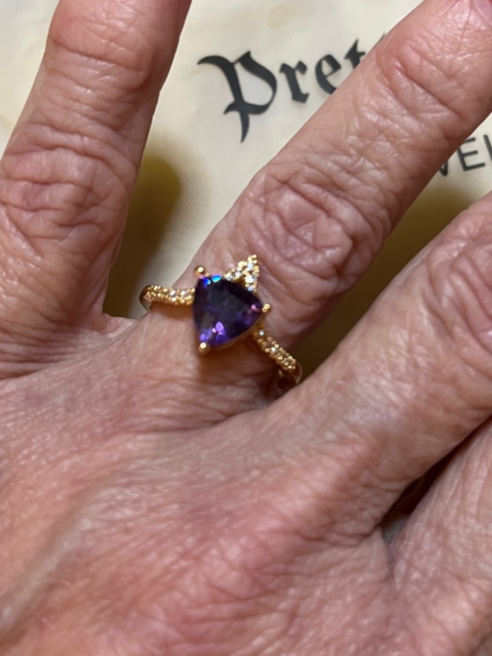 Pretty Bird Gold Ring with Purple Stone